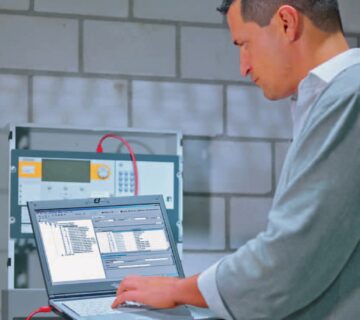 Engineer commissioning Cerberus Pro Fire Control Panel